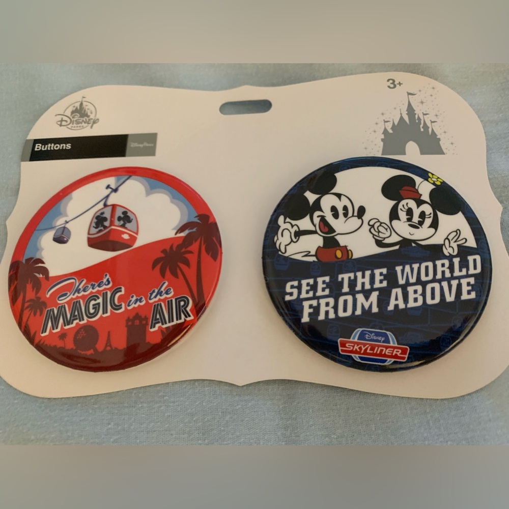 Pair of buttons of Disneys Skyliner